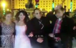بالفيديو.. عروسان يلتقطان الصور التذكارية مع جنود القوات المسلحة بالتحرير