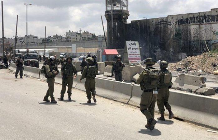 إسرائيل تعتقل 14 فلسطينيا من الضفة والقدس