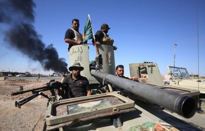 الدفاع العراقية ترد على تهديدات السفير الإيراني بضرب القوات الأمريكية
