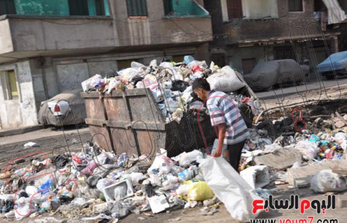 بالصور..القمامة تغطى شوارع شبرا الخيمة بالقليوبية