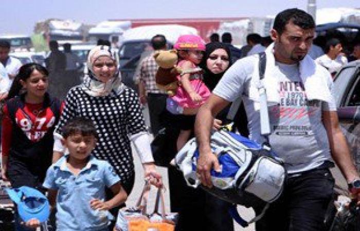 "الهجرة" العراقية تستقبل 222 عائلة فى "بيجى" نازحة من الشرقاط والقيارة