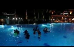 مساء dmc - | لاعبو المنتخب المصري يحتفلون بتأهلهم لكأس العالم بالقفز في حمام السباحة |