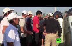 شاهد.. اشتباكات بين الشرطة وأنصار رئيس قرغيزستان السابق