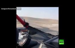 الإسباني ألونسو يقود سيارة "تويوتا" رفقة القطري العطية على الكثبان الرملية