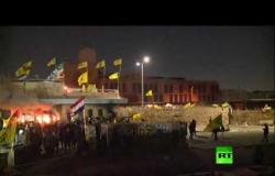 محتجون يحرقون البوابة الثانية للسفارة الأمريكية في بغداد