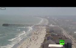 كاميرات تسجل حشود المصطافين على شاطئ أمريكي رغم كورونا