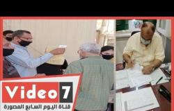 موظفوا محافظة القاهرة يلتزمون بارتداء الكمامة بمقر المحافظة