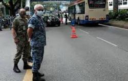 احتجاز مهاجرين اثنين يصيب 50 ماليزياً بـ"كورونا"
