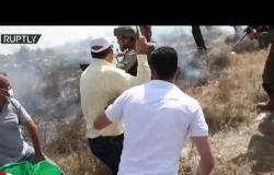 اندلاع اشتباكات مع محاولة متظاهرين فلسطينيين زراعة أشجار الزيتون بالقرب من نابلس