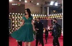 رانيا يوسف تستعرض إطلالتها على الريدكاربت في مهرجان القاهرة السينمائي الدولي