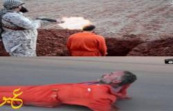بالصور.. داعش يعدم شخص رميًا بالرصاص ويسحل آخر فى شوارع ليبيا 