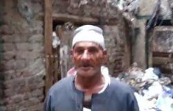 بالفيديو..مواطن يعيش بمقلب زبالة:"راضى بالأقل عشان اللى بيعمله السيسى لمصر"