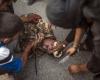 "تايم" الأمريكية تنشر صور ذبح جندى سورى على أيدى عناصر تنظيم القاعدة بسوريا